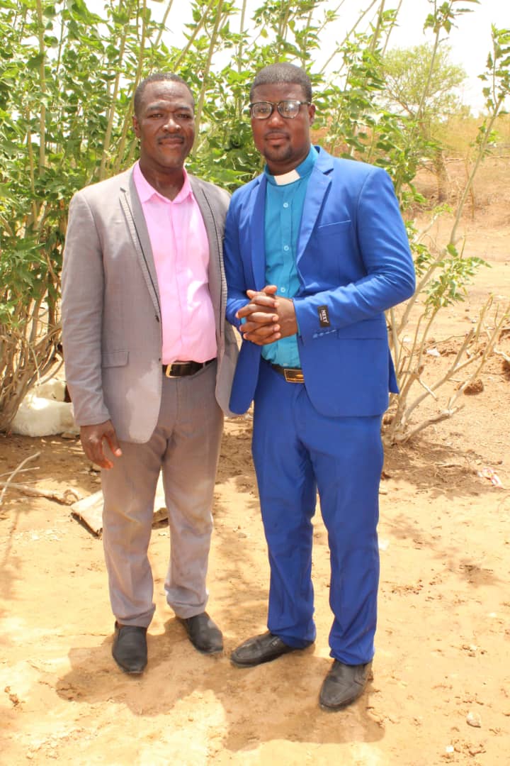 Pastor and church leader with congregation